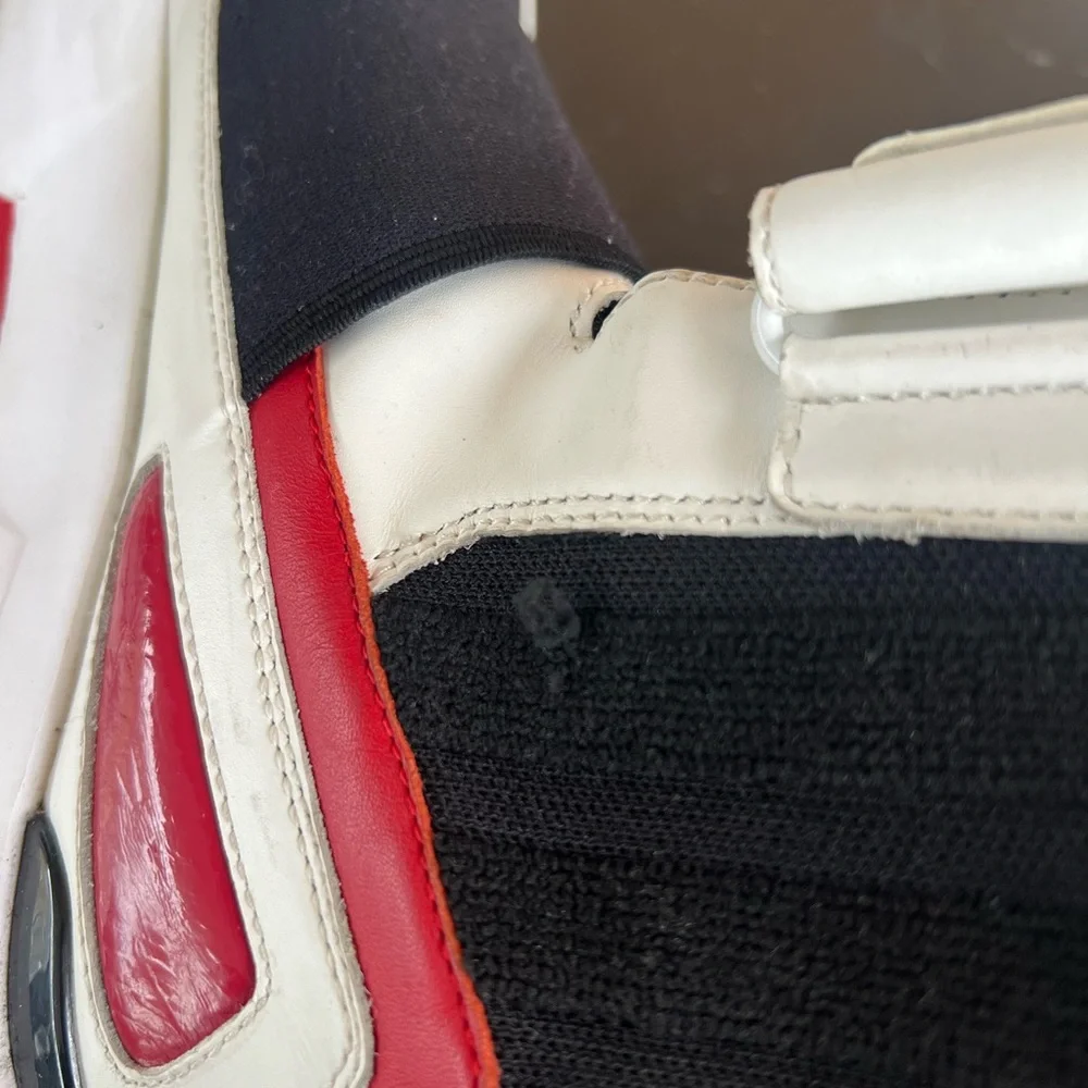 Michael Kors Black and White High-Top Sneakers with Red Accents - Picture 15 of 16